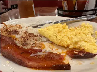 Photo of a bacon and egg breakfast