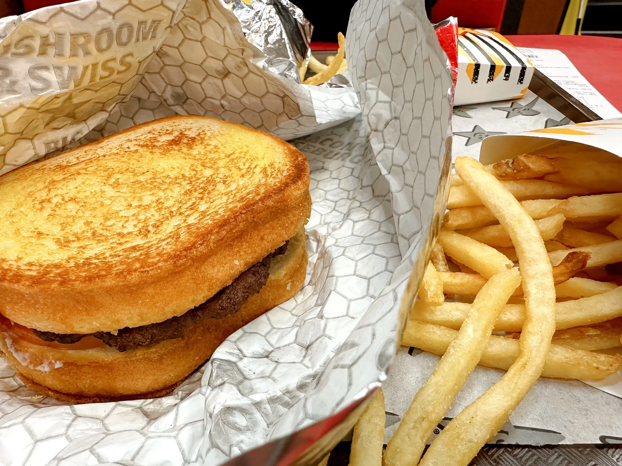 Photo of a Frisco Burger and fries