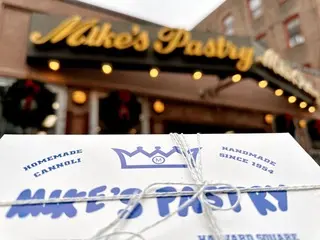 Photo of a Mike's Pastry box and sign